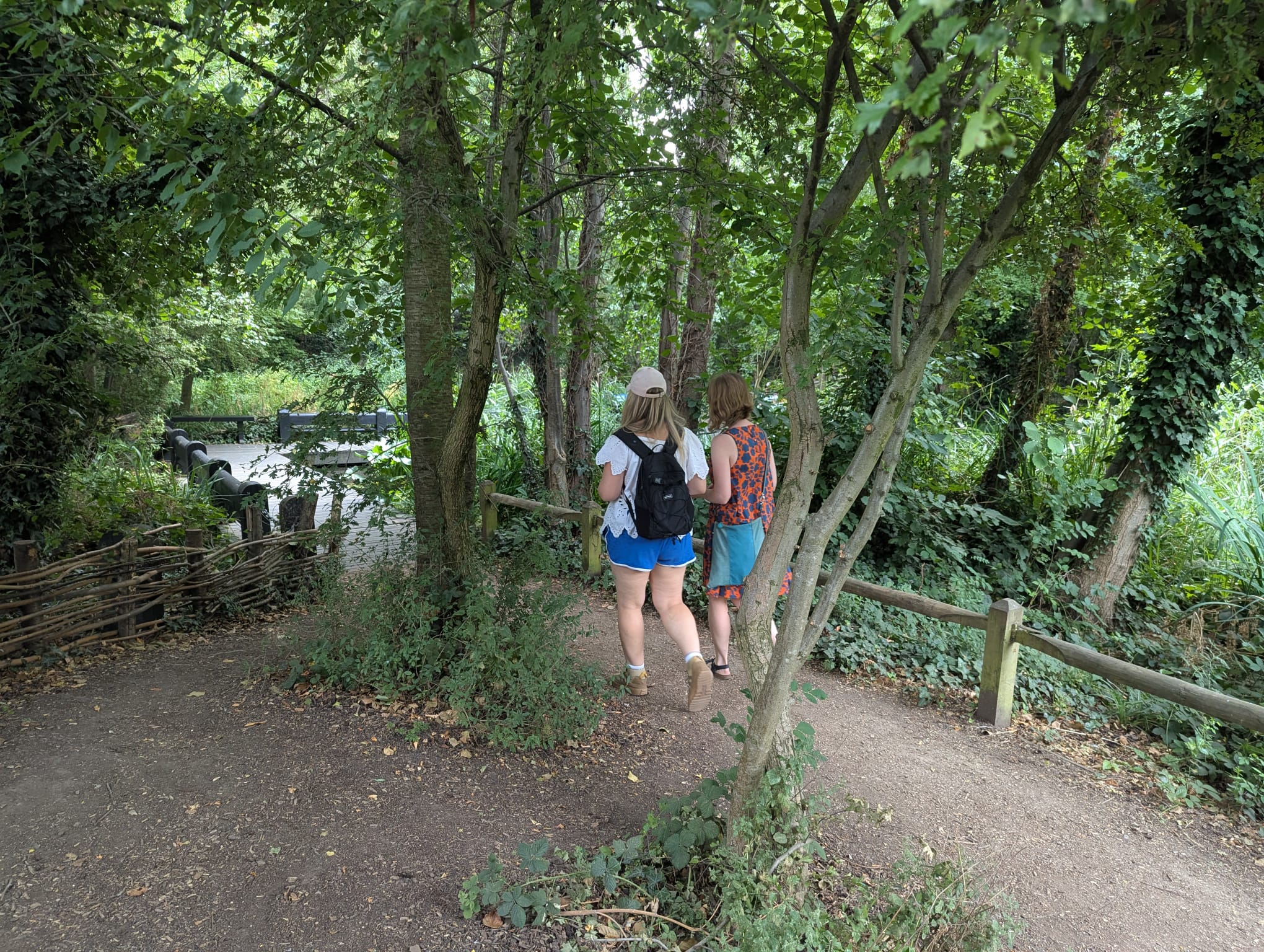Charlotte coaching a client in a green space in central London